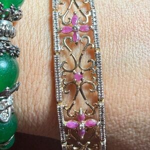 Sterling silver 925   14k gold overlay Ruby tennis bracelet